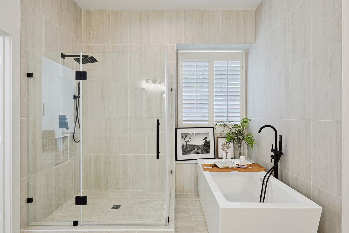 Walk-in shower with frameless glass