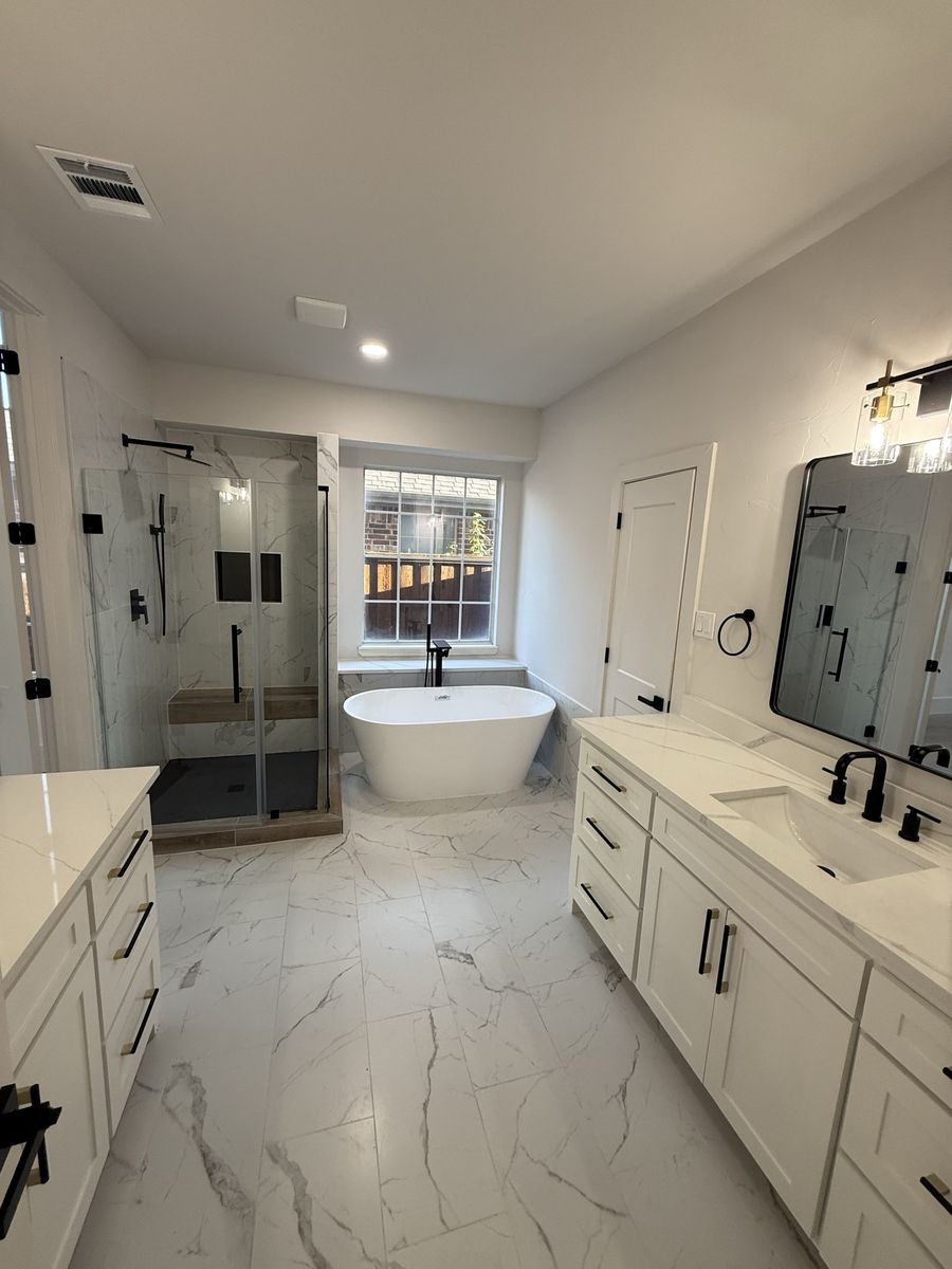 Walk-in shower with black rain head