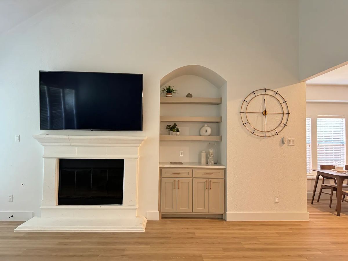Living room with fireplace and built-ins