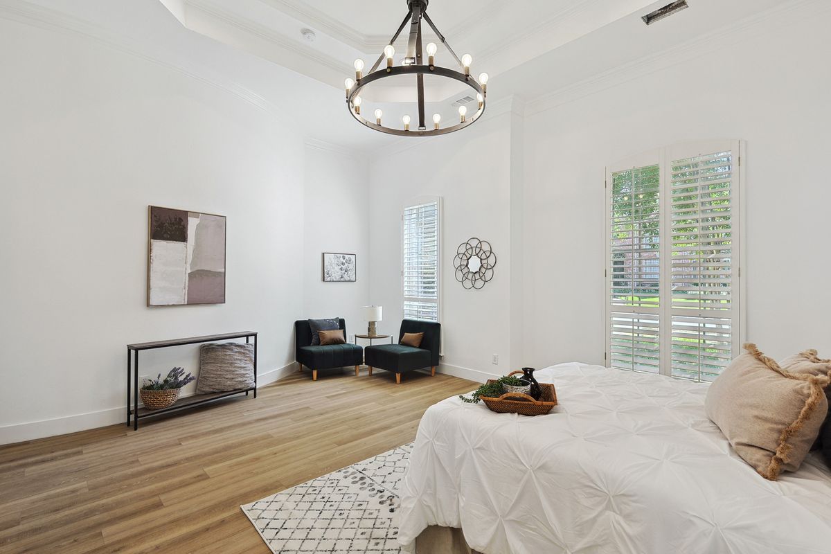 Primary bedroom with sitting area