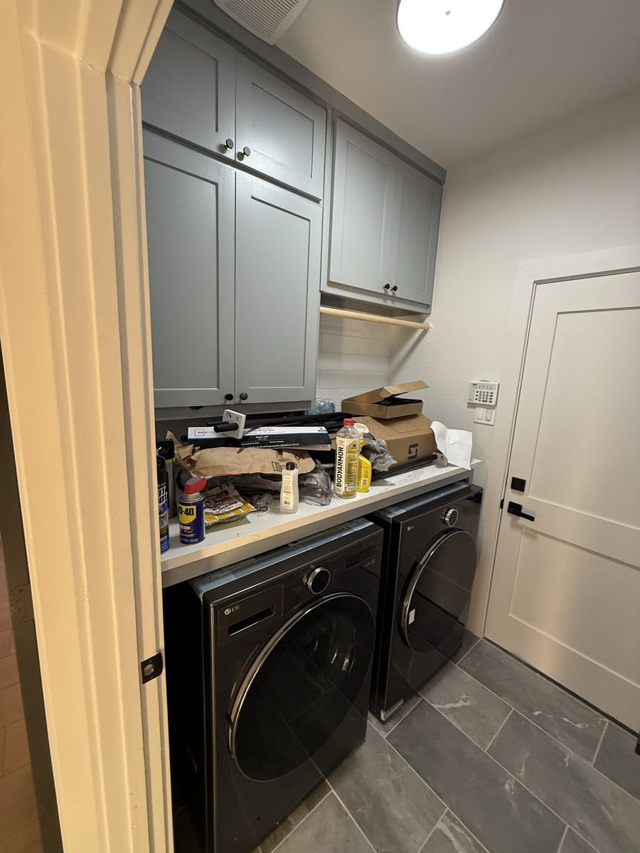 Laundry room with custom cabinetry