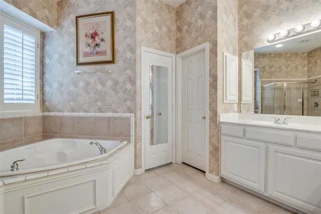Original primary bathroom with corner jetted tub