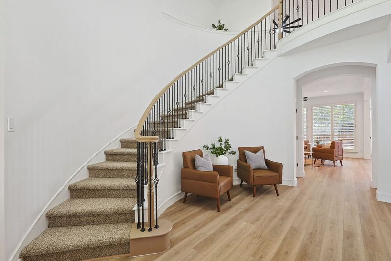 Curved staircase with refinished treads